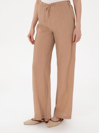 شلوار پارچه ای زنانه بژ پیرکاردین