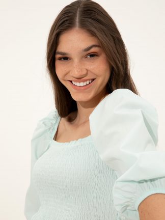 بلوز زنانه آبی فیروزه ای پیرکاردین