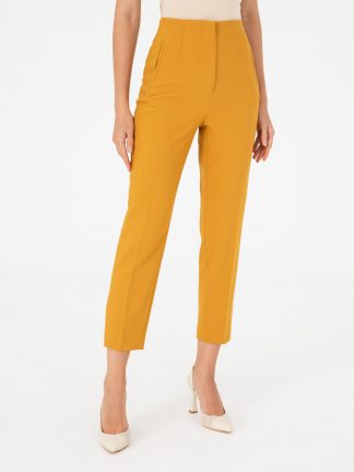 شلوار پارچه ای زنانه زعفرانی پیرکاردین