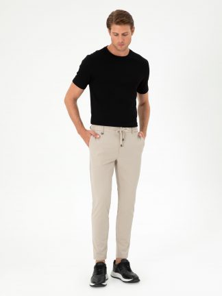 شلوار پارچه ای مردانه بژ پیرکاردین