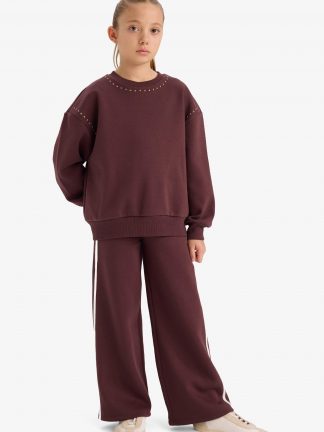 شلوار راحتی دخترانه قهوه ای روشن دفکتو تصویر ۱